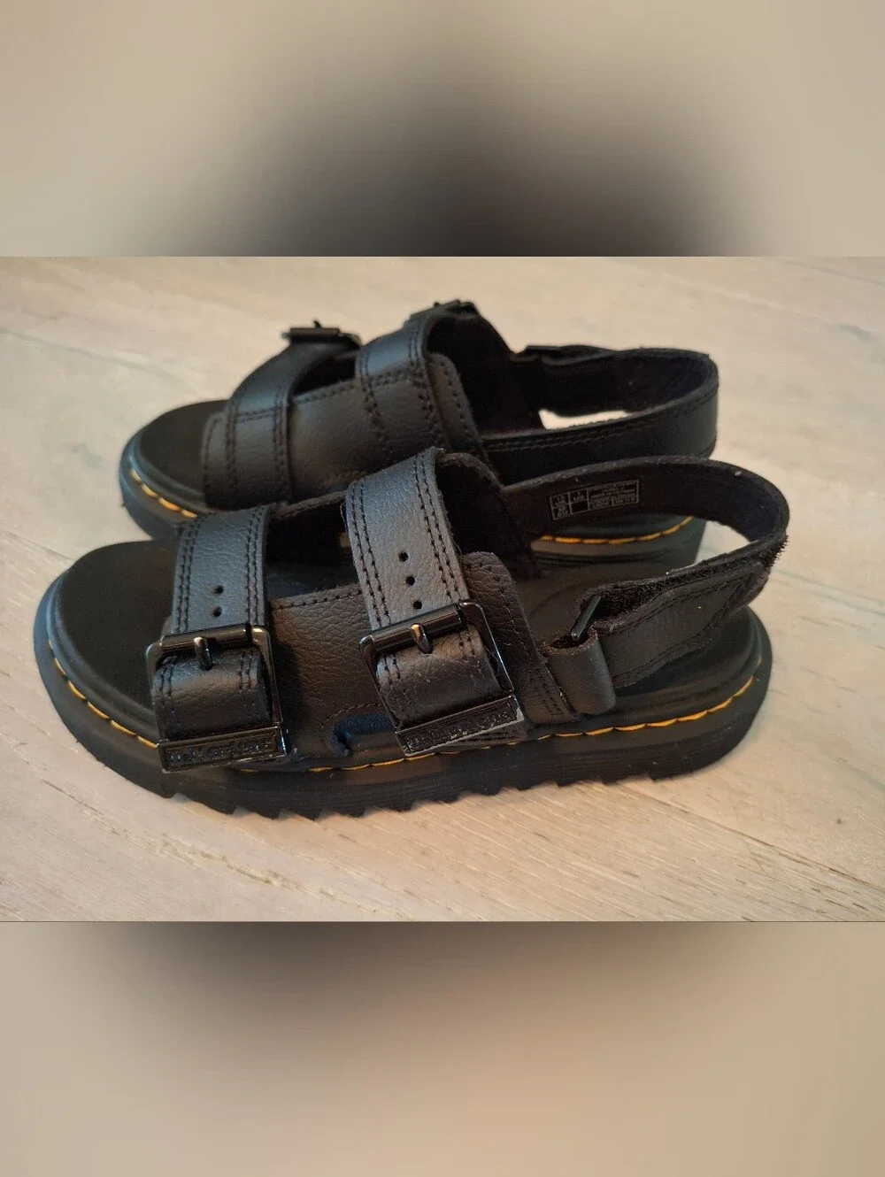 Kids Dr. Martens Black Leather Triple-Strap Sandals with Yellow Stitching